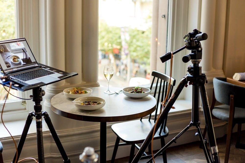 food on table and camera to take photo